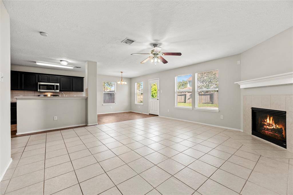 A large living area with a comfortable and inviting feel offers the perfect setting for relaxation and socializing.