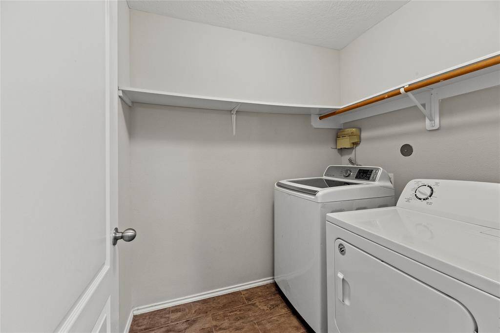 This well-appointed space includes ample storage and efficient organization, making laundry day a breeze while keeping your home tidy and functional.