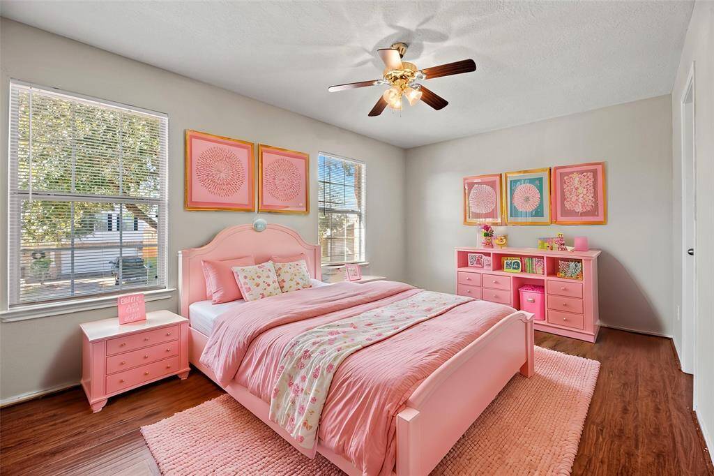 The second bedroom is also spacious and comfortable, bathed in natural light.