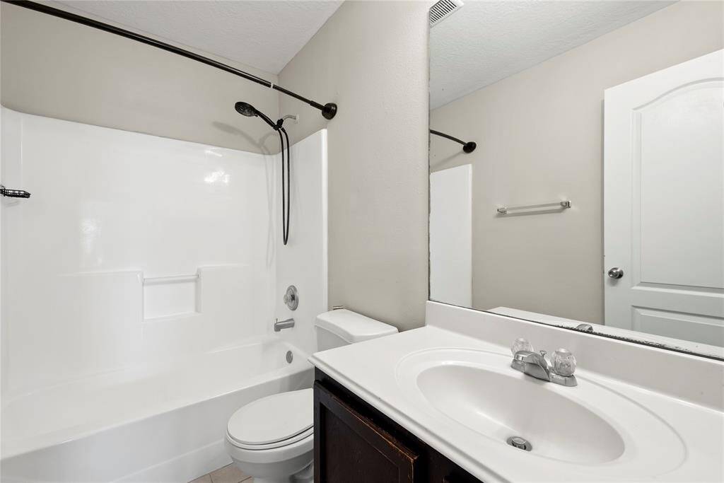 The second full upstairs bath.