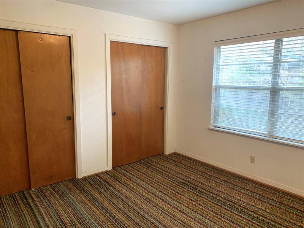 Middle bedroom also has 2 closets and a large window.