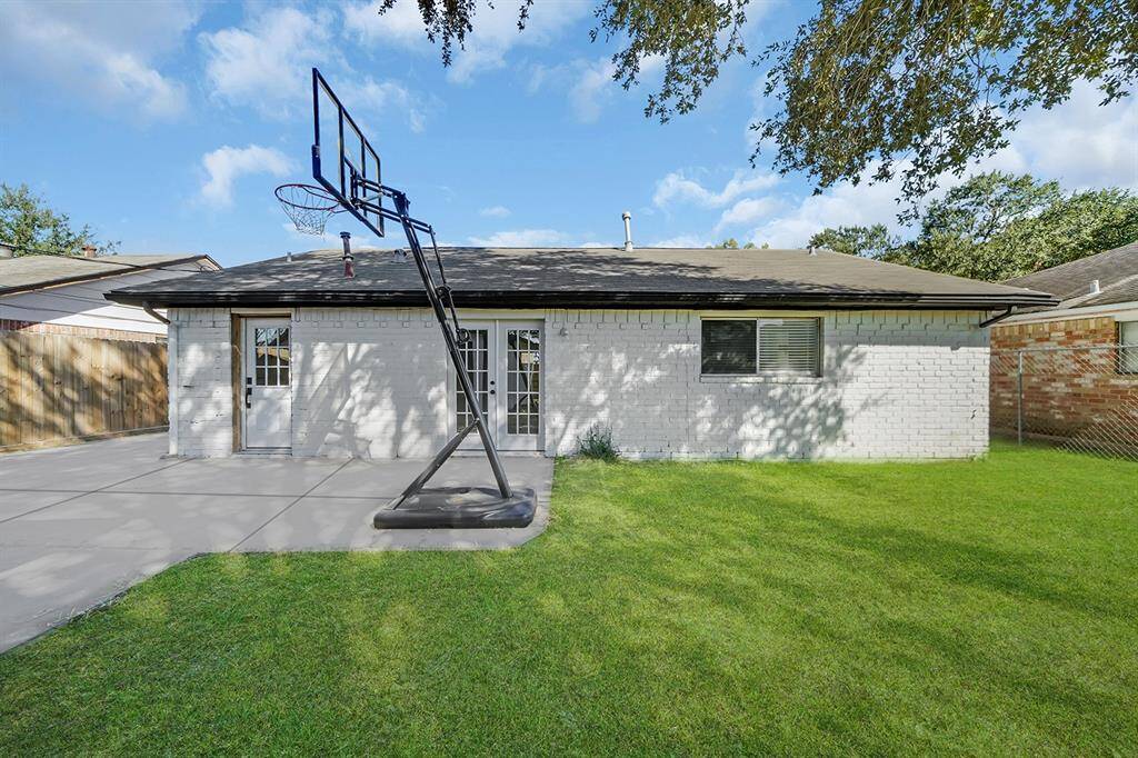 Spacious backyard, ready for family, friends, and guests to enjoy.