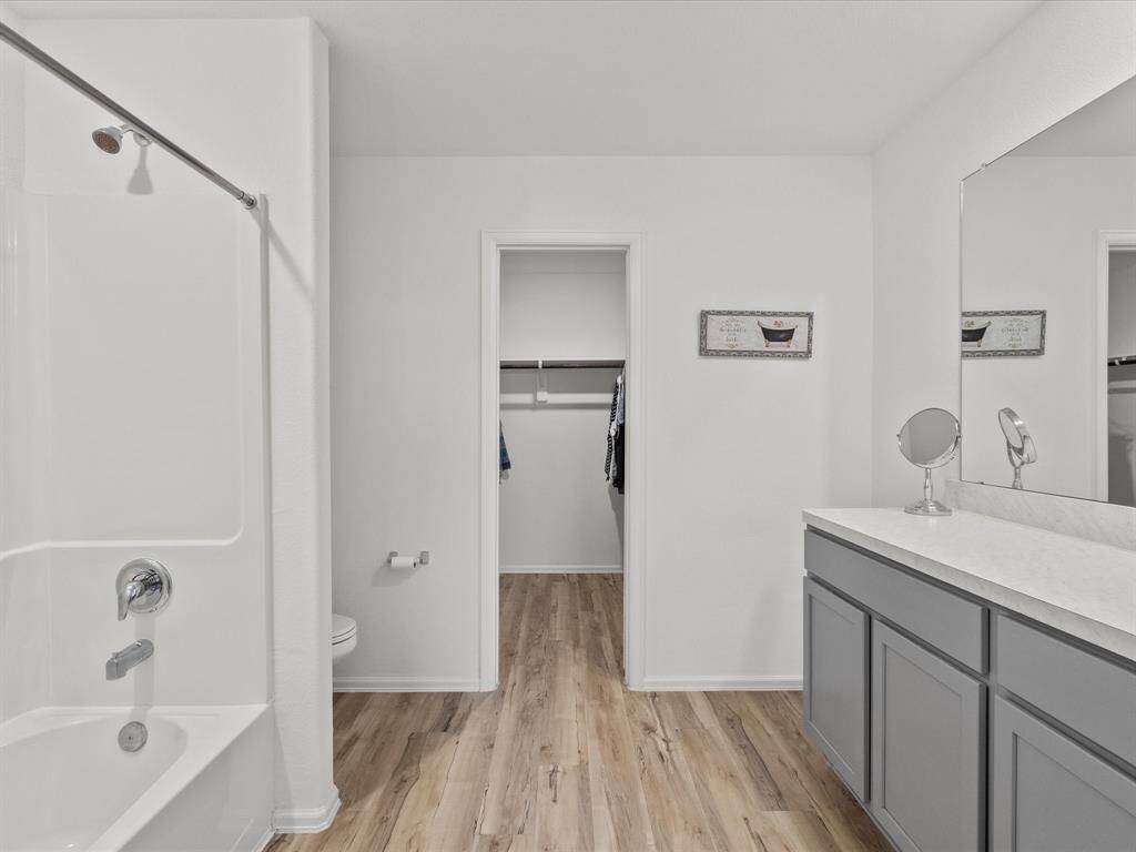 Very bright and spacious as you walk into the oversized primary closet.