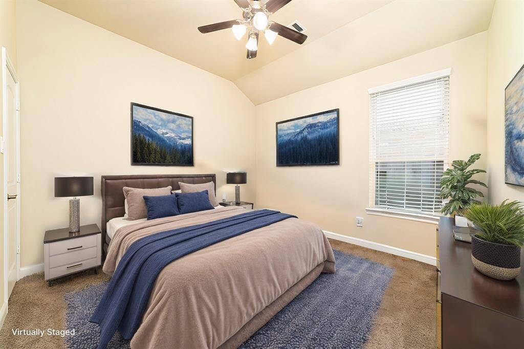 Virtually staged secondary bedroom 2