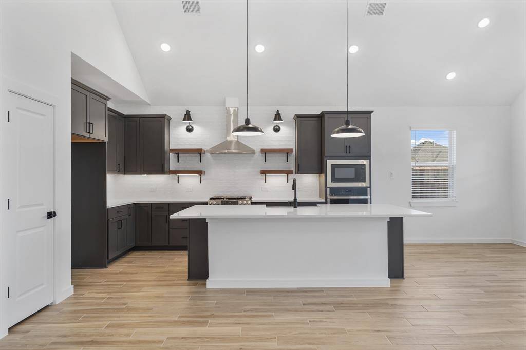 Lovely kitchen open to the great room (*Photo not of actual home and used for illustration purposes only.)
