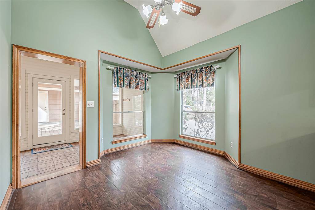 The kitchen flows effortlessly into a cozy breakfast area, ideal for casual dining.