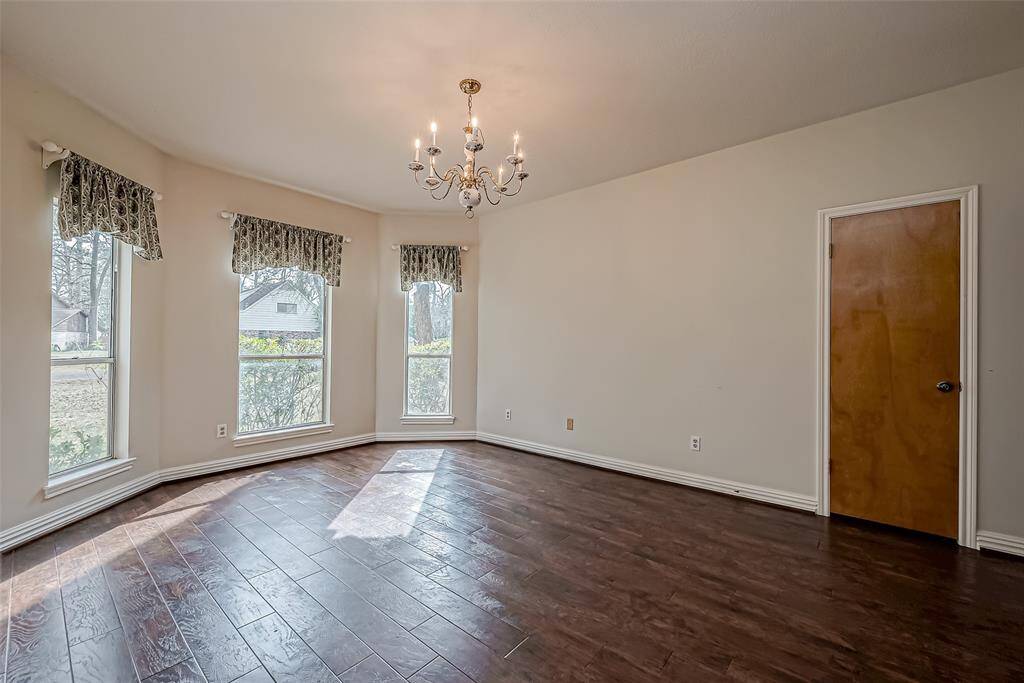 This elegant study is designed to inspire productivity and creativity, featuring stunning floor-to-ceiling windows that flood the room with natural light and offer breathtaking views of the surrounding area.