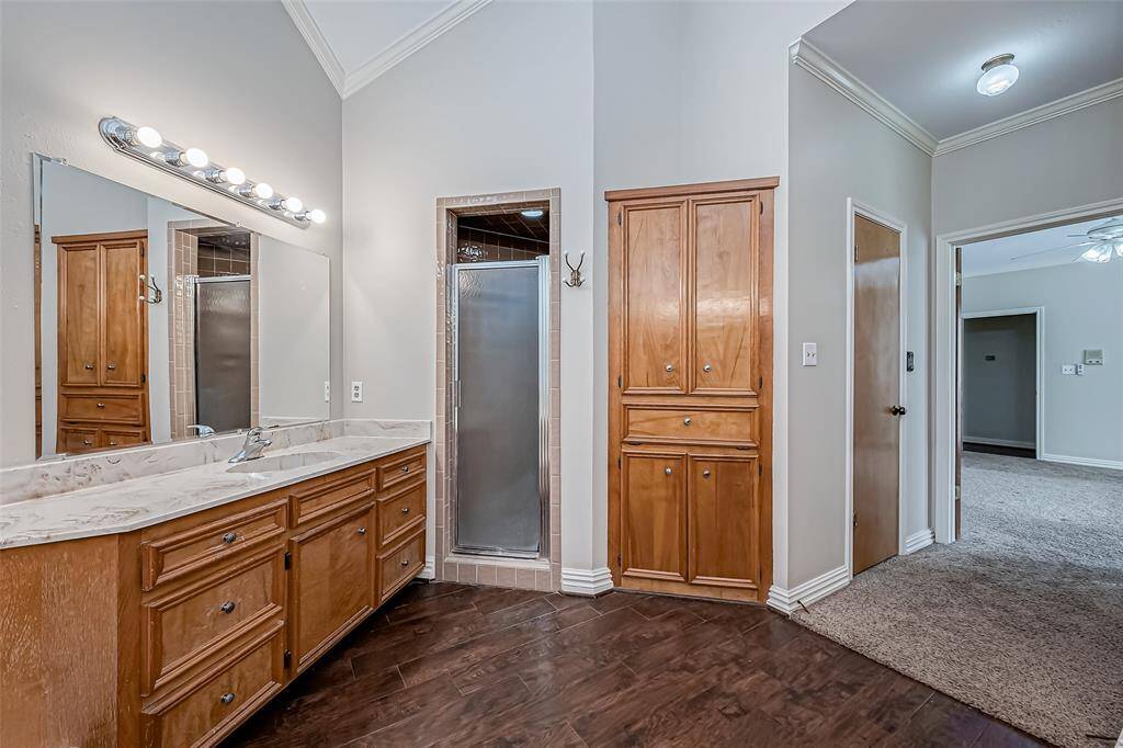 Separate shower with lots of storage.