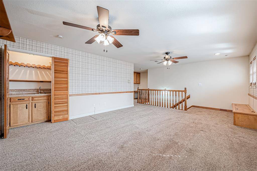 Step into this expansive game room, perfect for creating unforgettable moments with family and friends.
