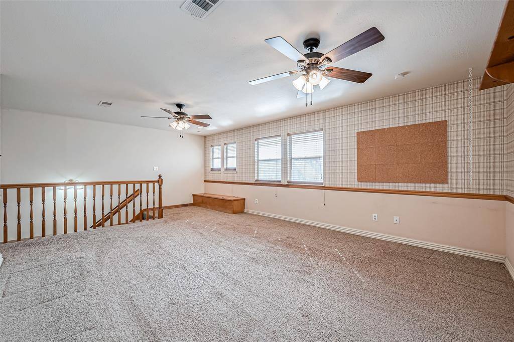 Featuring large windows for natural light, and plenty of room for customization, this game room is sure to be the heart of your home.