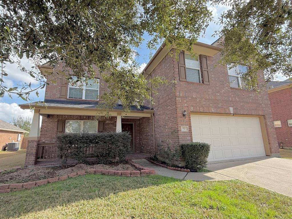 This well-loved single owner home showcases beautiful timeless brick exterior, a spacious front porch and thoughtfully designed architectural details.