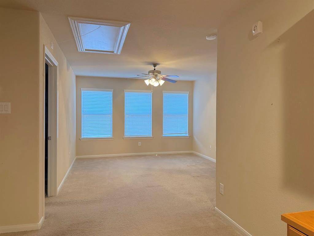 This spacious upstairs common area offers versatile space that can be easily transformed into a playroom, cozy living area, or entertainment space. Plenty of natural light creates bright and inviting atmosphere.