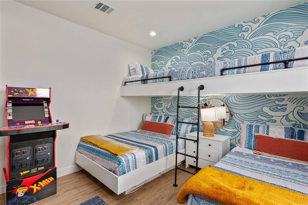 There are two built-in full sized platform beds and two lofted twin-sized beds, accessible with a ladder.