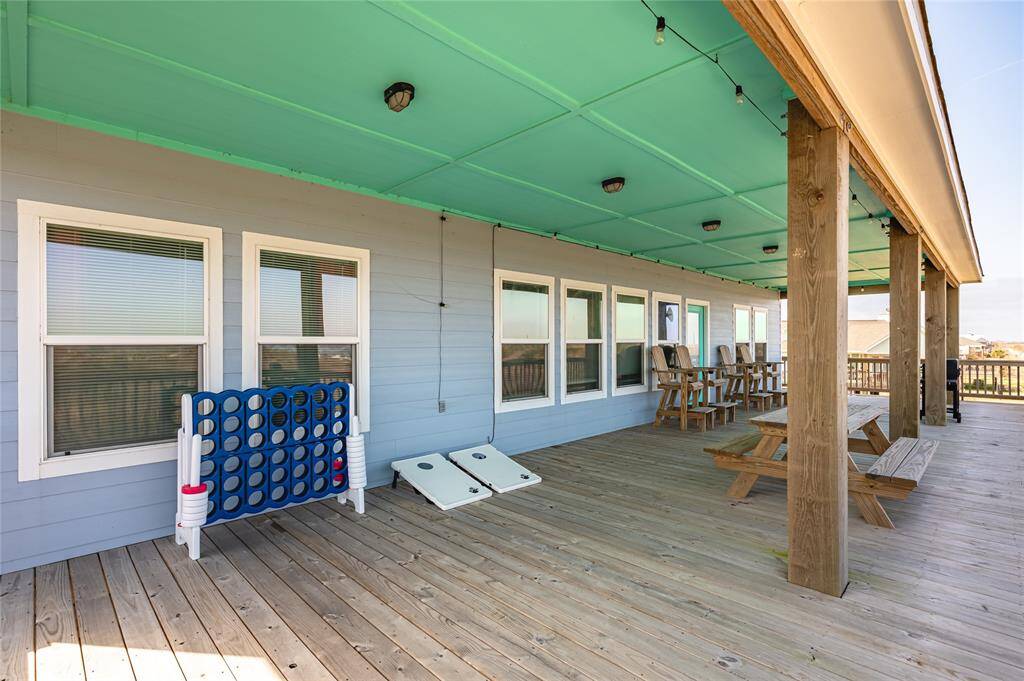 The deck is partially shaded and offers both a retreat from the sun and area to bask in its glow.