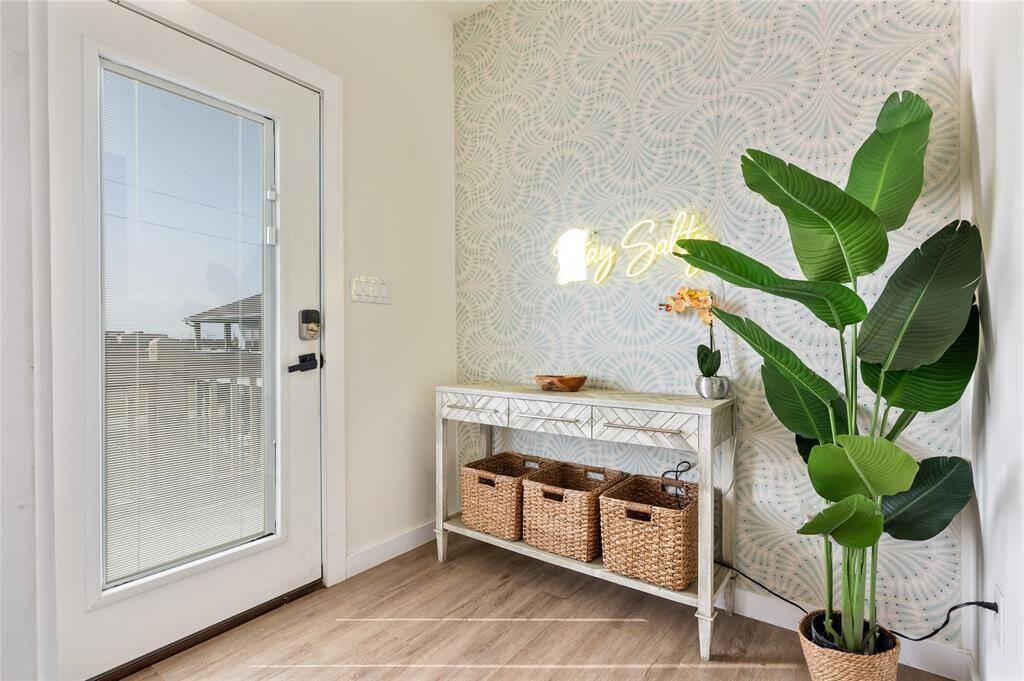 Inside, you're greeted by a mud room so you can drop your items and get into vacation mode!