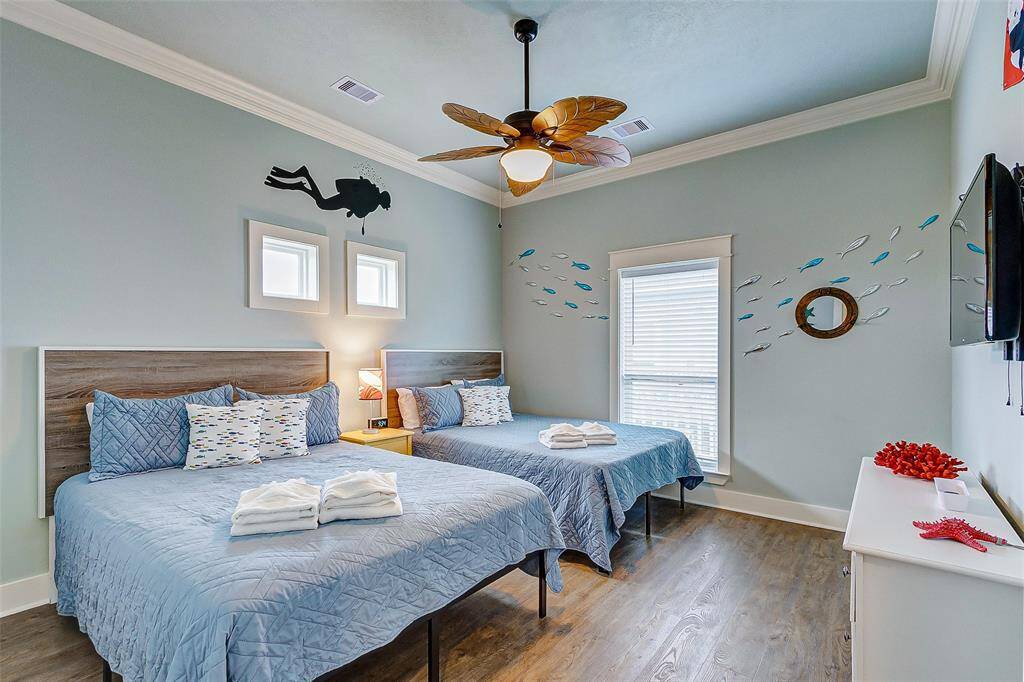 This room is outfitted with two queen beds for flexible sleeping arrangements.