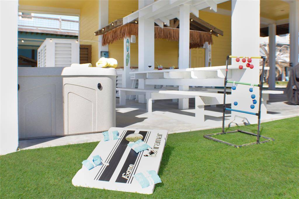 Hot tub, tiki bar, outdoor games! What more could you ask for?