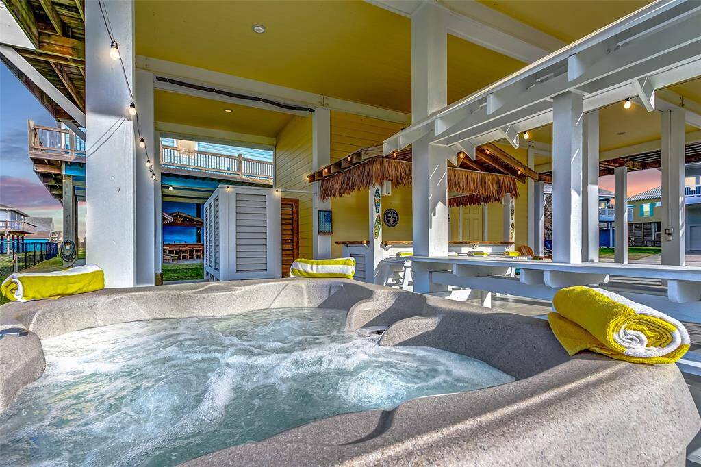 Nothing puts the "vacation" in "vacation home" like a hot tub and a tiki bar!