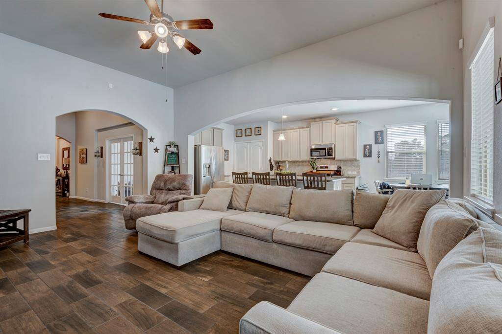 Kitchen opens up to the family room providing plenty of space for family gatherings.