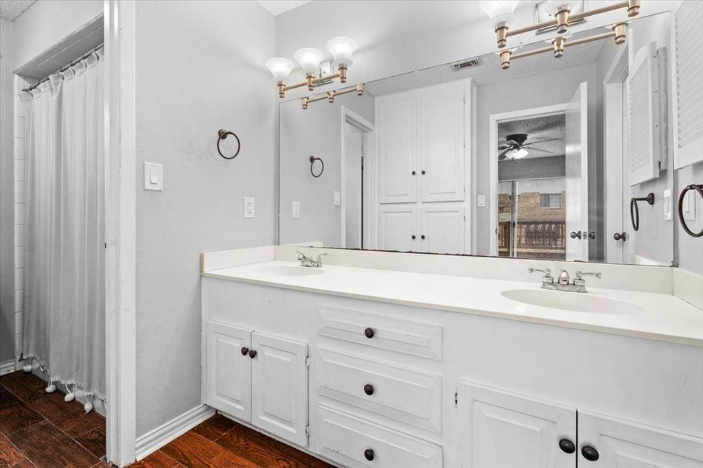 The primary bathroom has double sinks and more built ins!