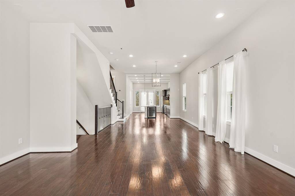 The formal dining room sits just between the living room & kitchen.