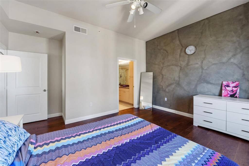 The door leads to a spacious ensuite bath and walk-in closet.