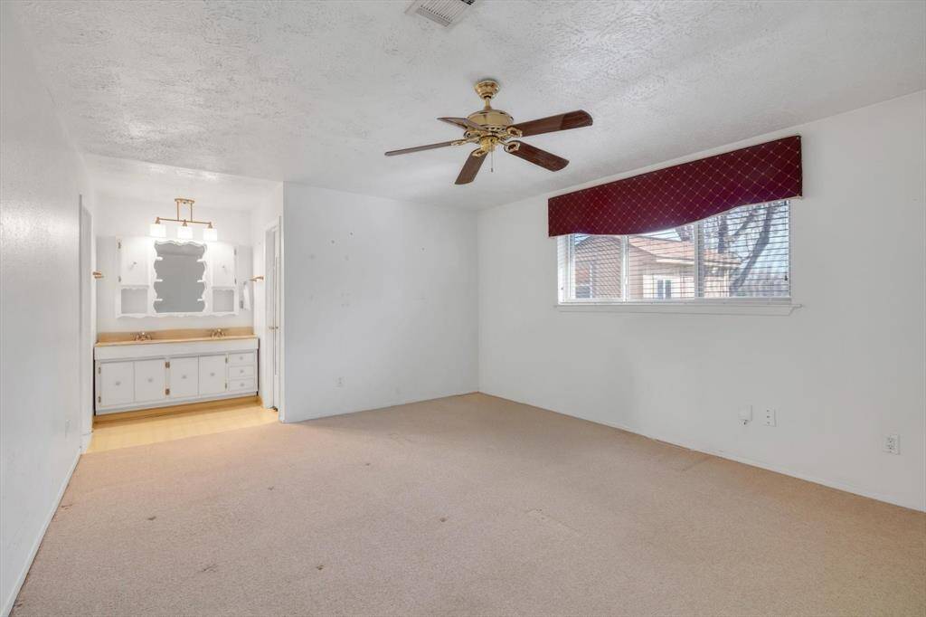 Split plan bedrooms.  Large primary with vanity and walk-in closet.