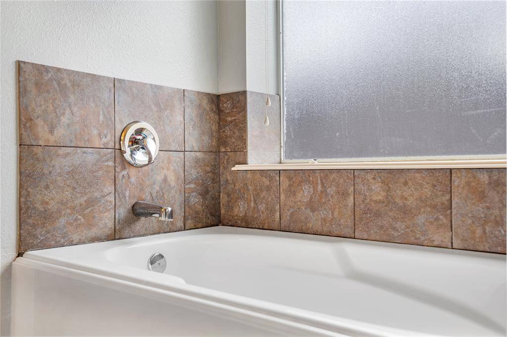 Relax at the end of a long day in your garden tub.