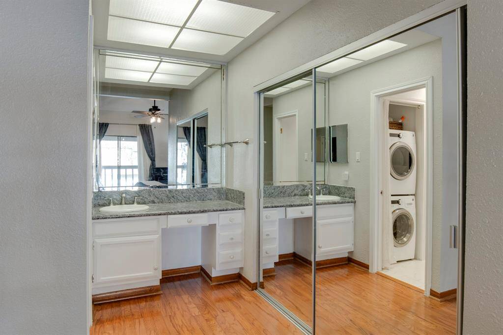 Primary bedroom has covered balcony and a walk-in closet and additional closet for storage.