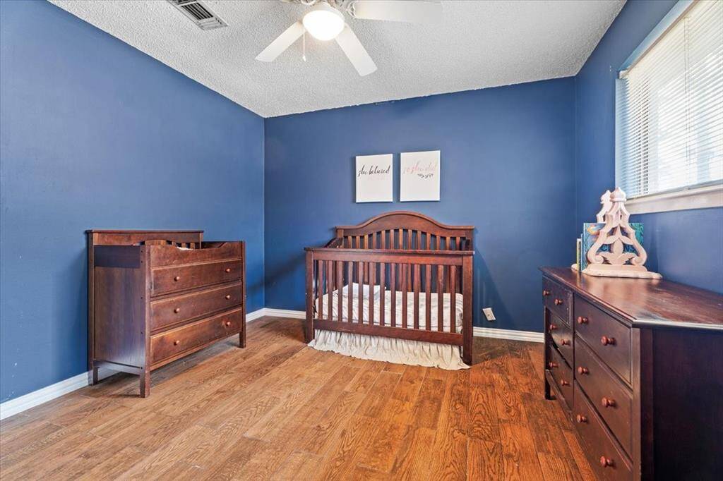 Another bedroom with a walk in closet.