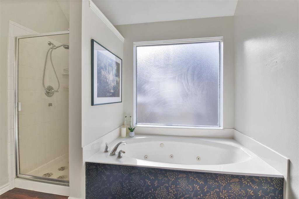 Separate shower with deep tub.