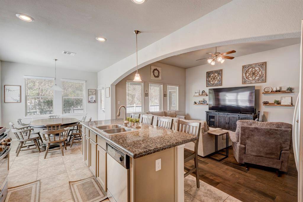 Dining area is tucked away in the corner providing a nice view of the back yard or the ability to watch TV while you sit to eat.
