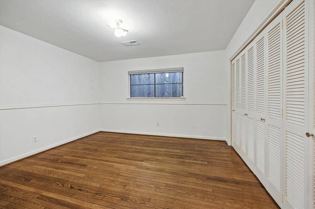 [Bedroom Two] One of two secondary bedrooms. Hardwood floors and good closet space.