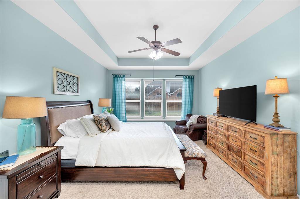 Primary Bedroom on the main, Elegant tray ceilings in the primary suite
