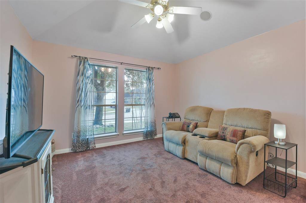 Front bedroom currently being used as another living area.