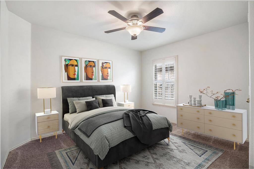 Bedroom #3 also has plantation shutters and a nice ceiling fan.