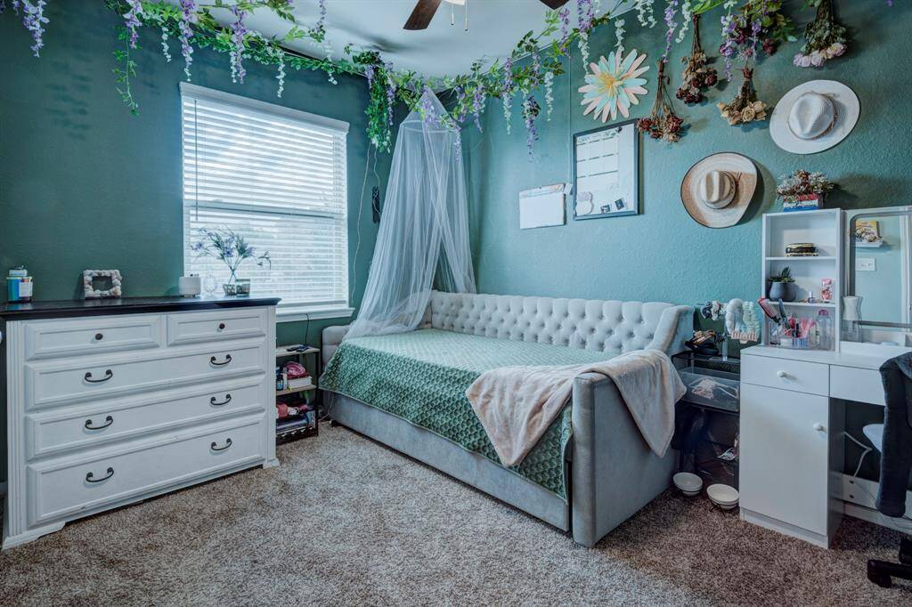 Bedroom 2 is in the front of the home. Bedroom offers an oversized closet.