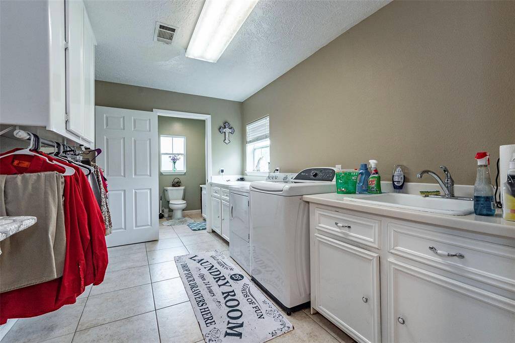The laundry area allows so much space and has a 1/2 bathroom with large closet