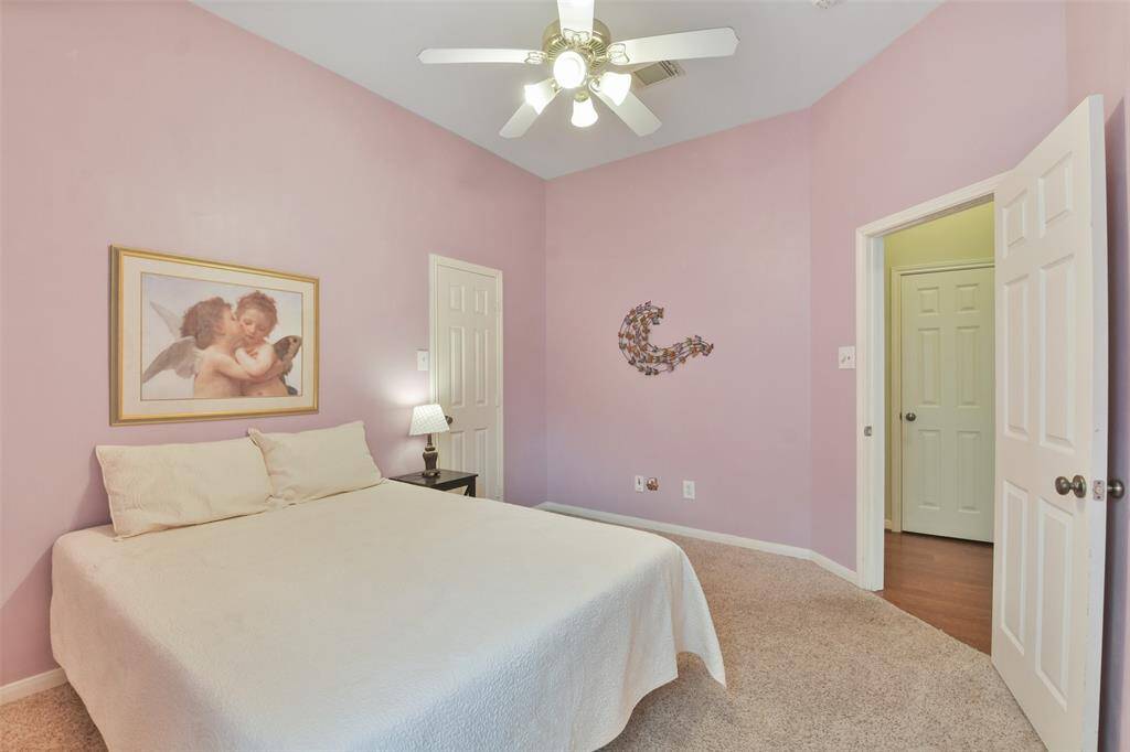 Secondary bedroom with walk in closet.