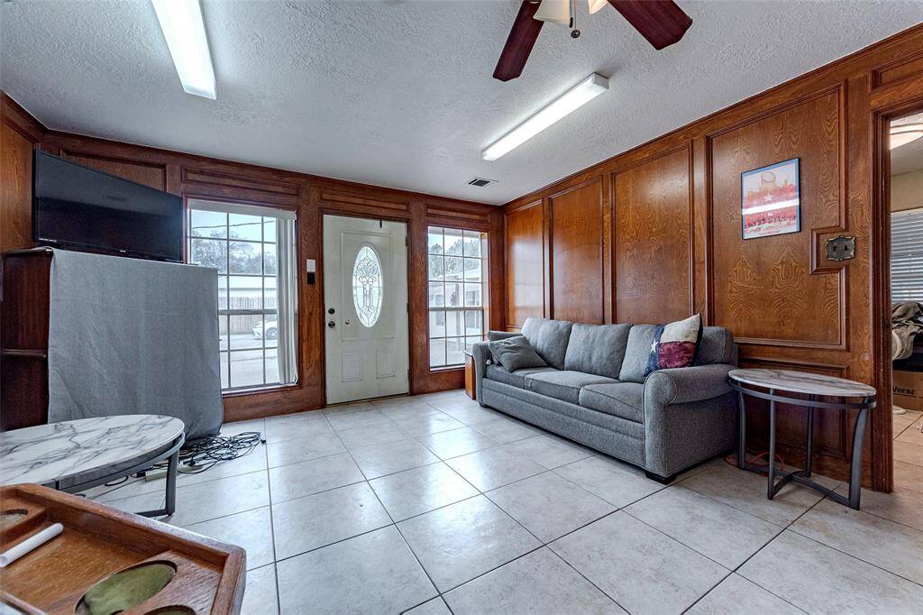 This is a 2nd office or library and entry from the driveway.