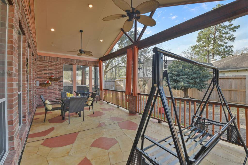 Extended back patio offers multiple seating areas and plenty of space!