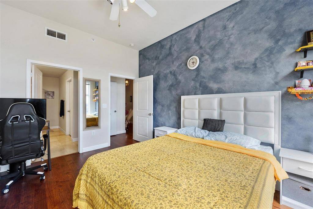 Another view of the second bedroom. The bathroom can be accessed from the bedroom and the hallway outside.