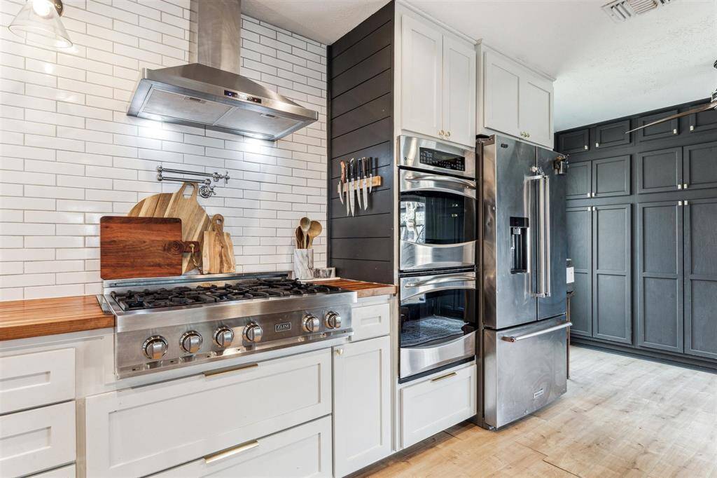 BEAUTIFUL with more views of the wall-to-wall pantry space.