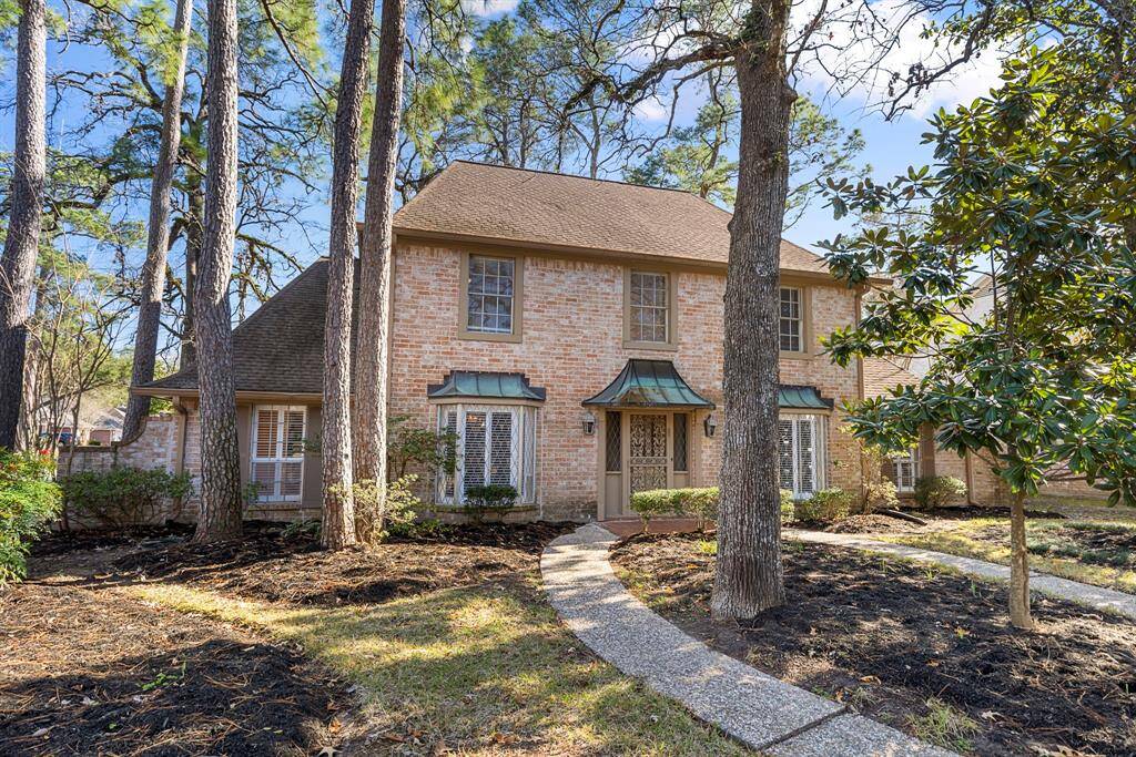 This home is located on a large corner lot with mature trees!