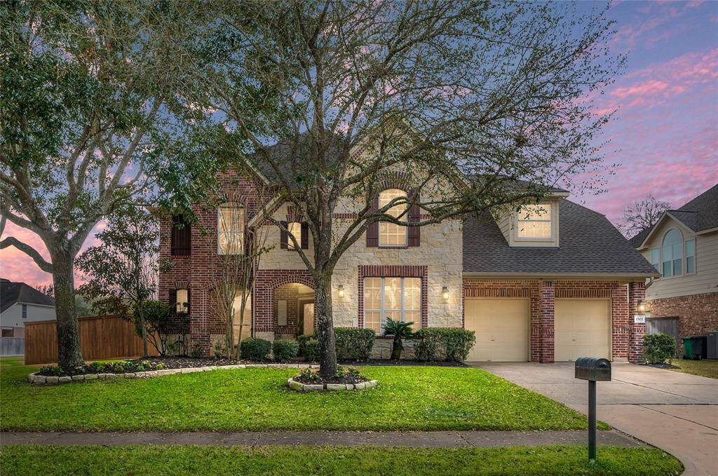Beautiful oversized corner lot with welcoming curb appeal and landscape.