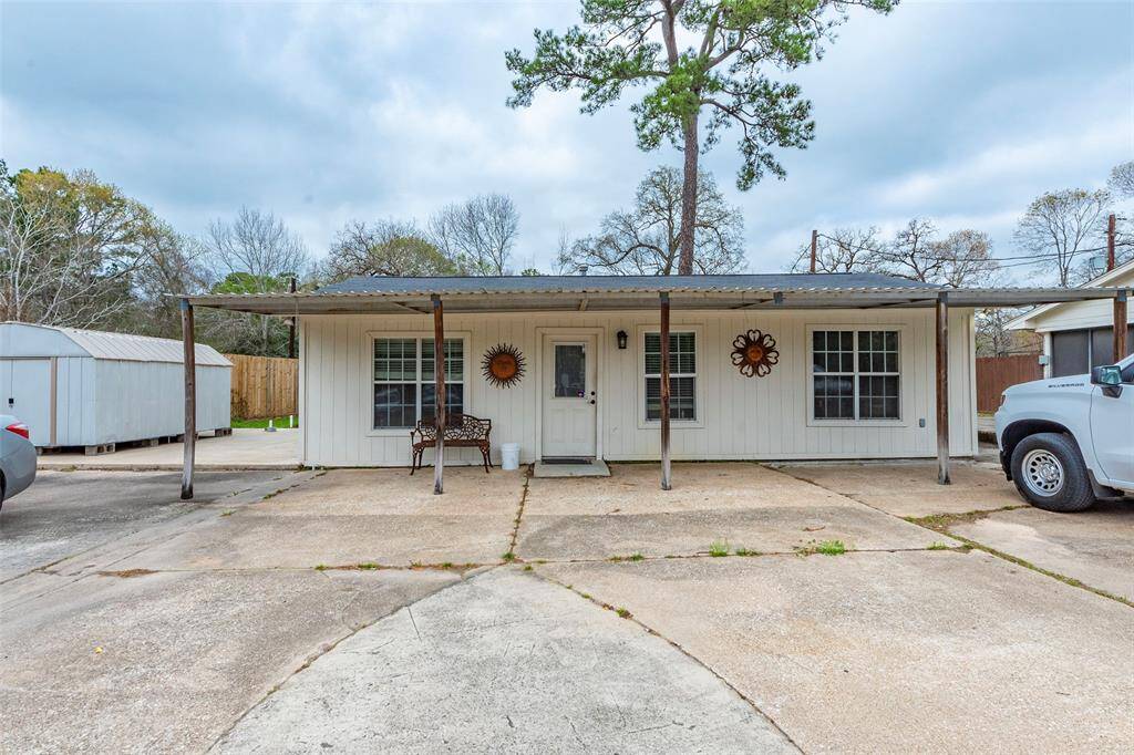 The 1 bedroom guest cottage is being used as an office.