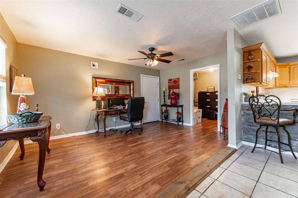 It has lovely wood floors as well as tile.