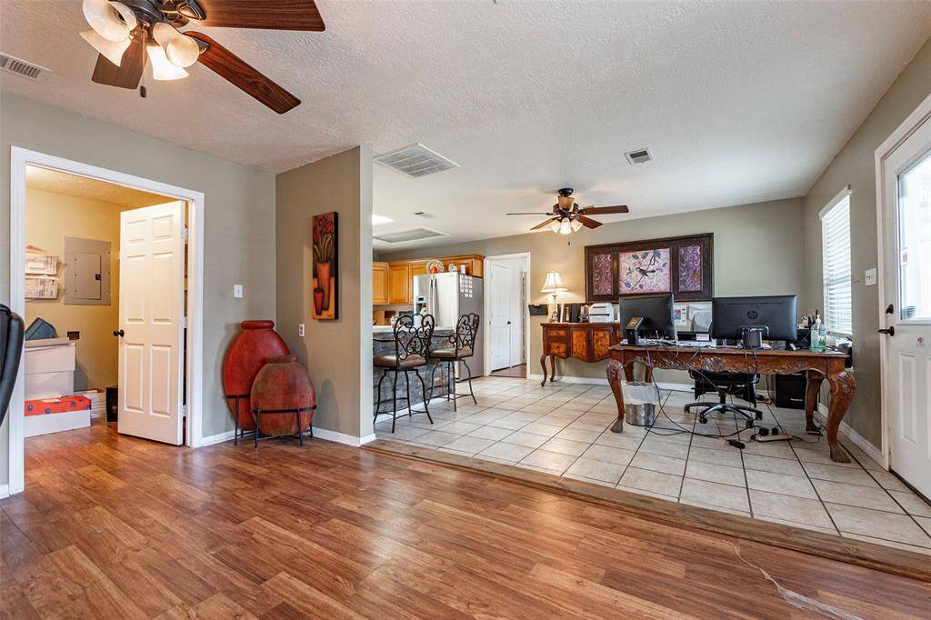 There is a laundry or storage space adjacent to the kitchen.