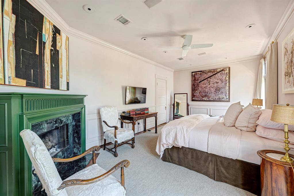 Primary suite with ample space for relaxation and personalization, this bedroom is both a tranquil haven and a stylish sanctuary.