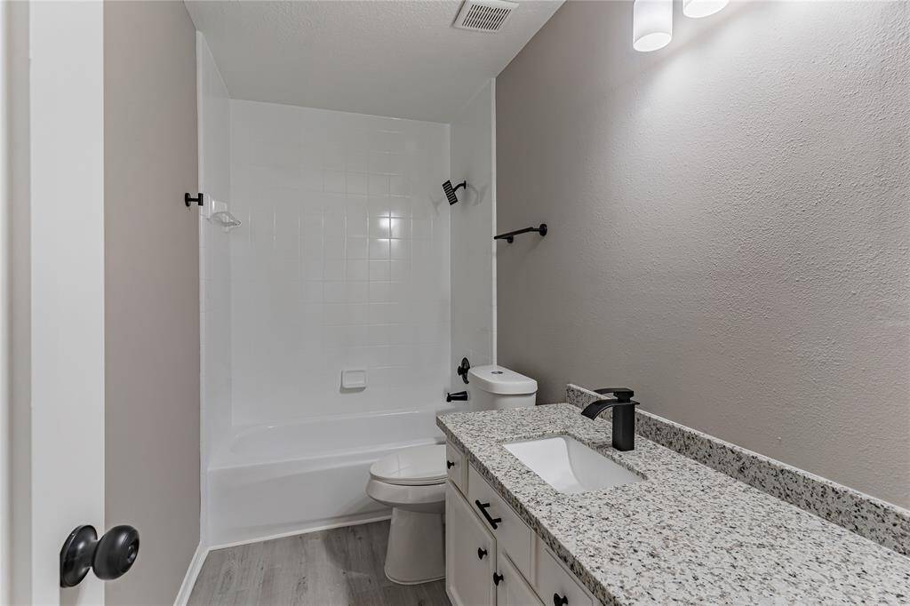Stunningly renovated full bathroom with modern finishes.